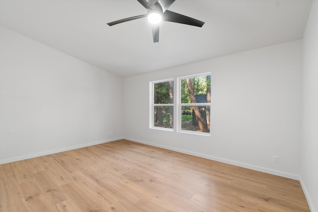 7727 Pegnan Rd, Shingletown, CA 96088 - unfurnished room featuring light wood-style flooring, baseboards, ceiling fan, and vaulted ceiling