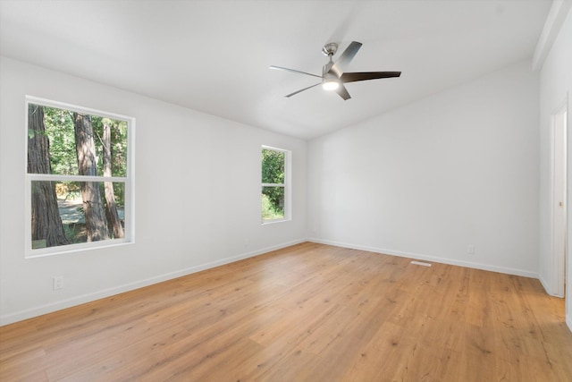 7727 Pegnan Rd, Shingletown, CA 96088 - unfurnished room with vaulted ceiling, light wood finished floors, ceiling fan, and baseboards
