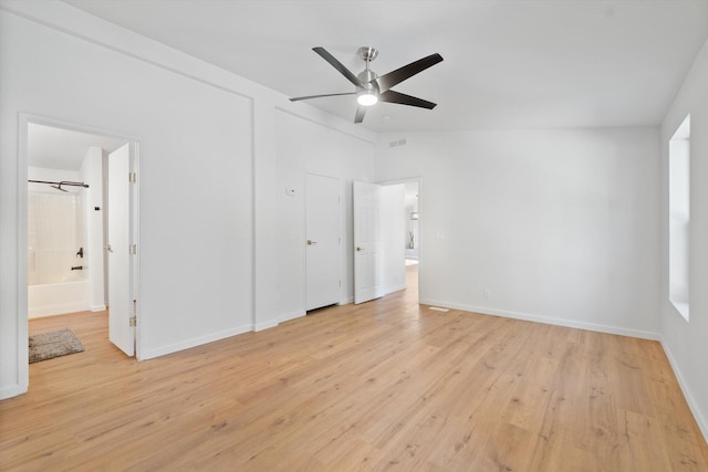 7727 Pegnan Rd, Shingletown, CA 96088 - unfurnished bedroom with light wood-style flooring, baseboards, ensuite bath, and ceiling fan