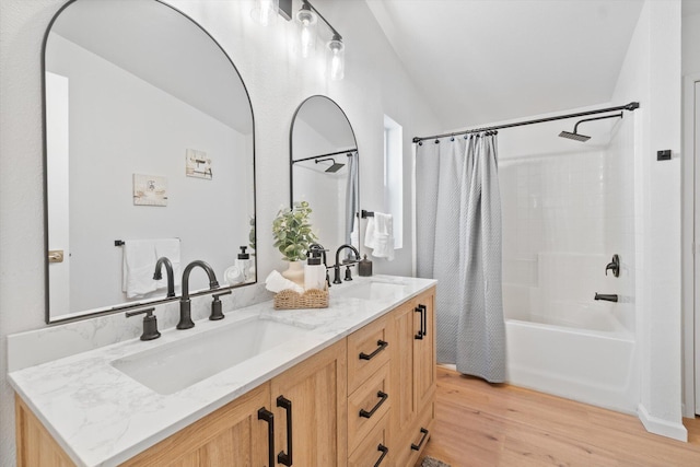 7727 Pegnan Rd, Shingletown, CA 96088 - full bathroom featuring shower / bathtub combination with curtain, double vanity, wood finished floors, and vaulted ceiling