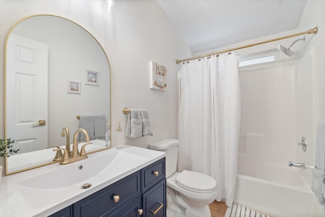 7727 Pegnan Rd, Shingletown, CA 96088 - full bath featuring toilet, lofted ceiling, vanity, shower / bath combo, and wood finished floors
