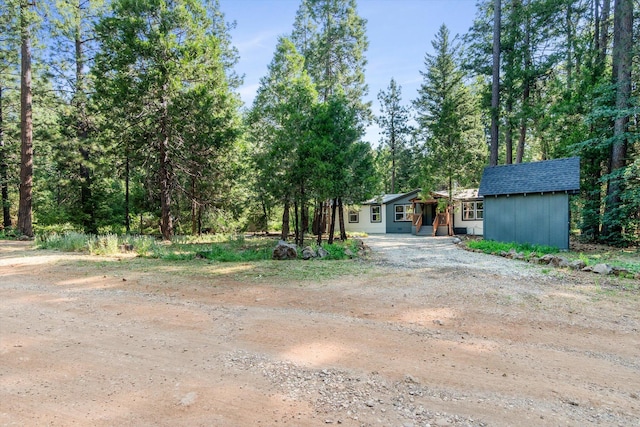 7727 Pegnan Rd, Shingletown, CA 96088 - view of yard with driveway