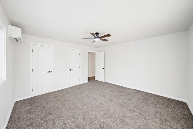 1949 Montana Ave, Shasta Lake, CA 96019 - unfurnished bedroom featuring a wall mounted AC, carpet flooring, baseboards, and ceiling fan