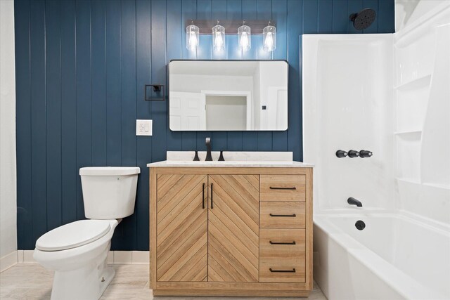 1949 Montana Ave, Shasta Lake, CA 96019 - bathroom with vanity, toilet, tub / shower combination, and baseboards