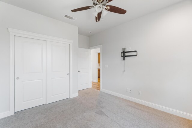 4537 Risstay Way, Shasta Lake, CA 96019 - unfurnished bedroom with carpet, a closet, and a ceiling fan