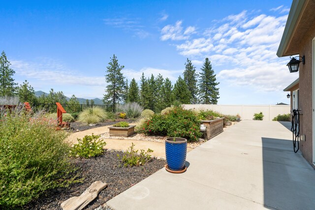 4537 Risstay Way, Shasta Lake, CA 96019 - fenced backyard featuring a patio