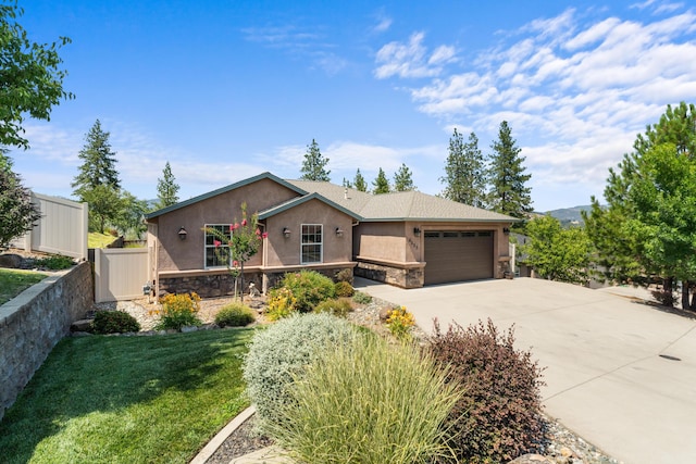 4537 Risstay Way, Shasta Lake, CA 96019 - ranch-style home featuring stone siding, stucco siding, a garage, and driveway