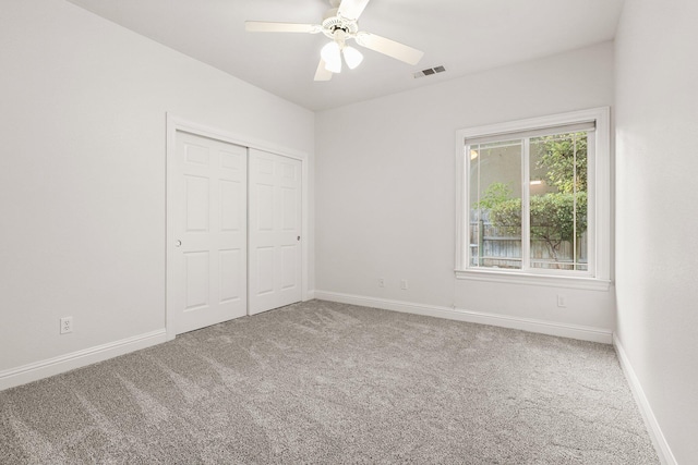 4230 Brittany Dr, Redding, CA 96002 - unfurnished bedroom with carpet flooring, a closet, and ceiling fan