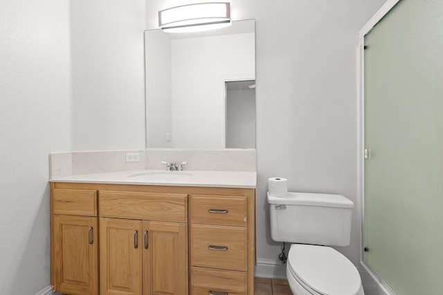 4230 Brittany Dr, Redding, CA 96002 - bathroom featuring an enclosed shower, vanity, and tile patterned flooring