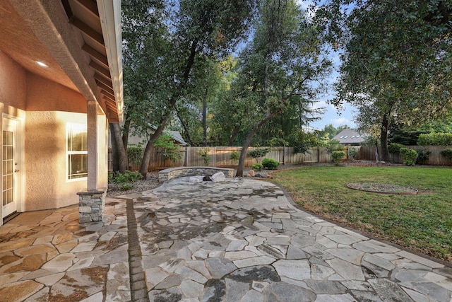 4230 Brittany Dr, Redding, CA 96002 - fenced backyard with a patio area