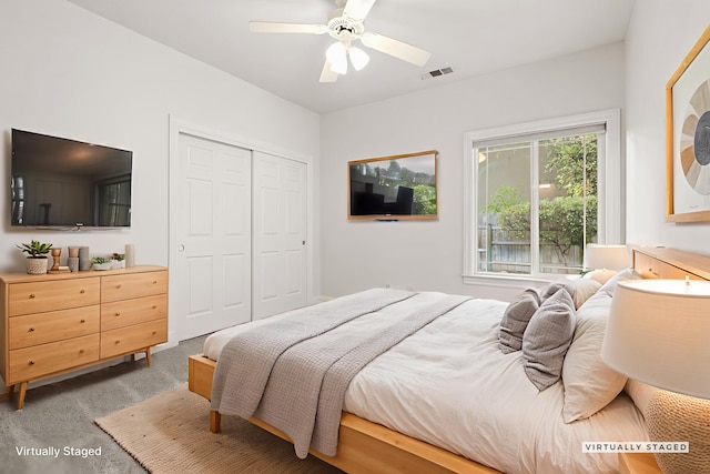 4230 Brittany Dr, Redding, CA 96002 - carpeted bedroom with a closet and ceiling fan