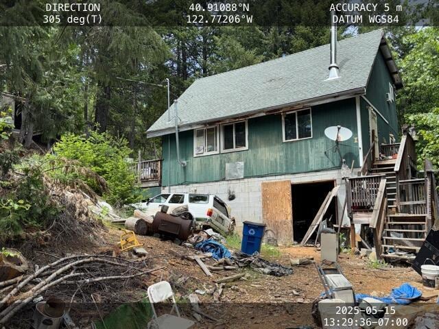 200 Millview Dr, Trinity Center, CA 96091 - view of front facade with stairway and a shingled roof