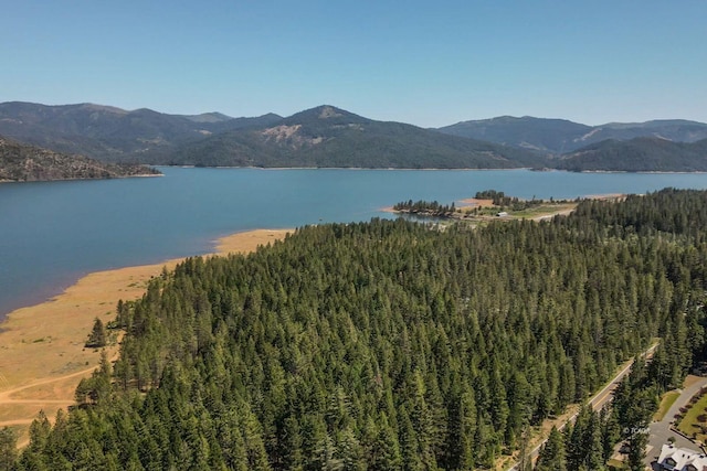 131 Northwoods Ests, Trinity Center, CA 96091 - water view with a mountainous background and a heavily wooded area