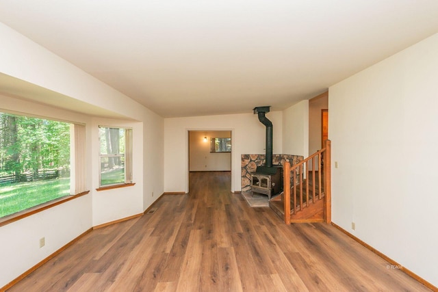 131 Northwoods Ests, Trinity Center, CA 96091 - unfurnished room with wood finished floors and a wood stove