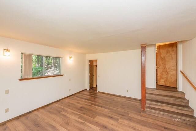 131 Northwoods Ests, Trinity Center, CA 96091 - empty room featuring wood finished floors and stairs