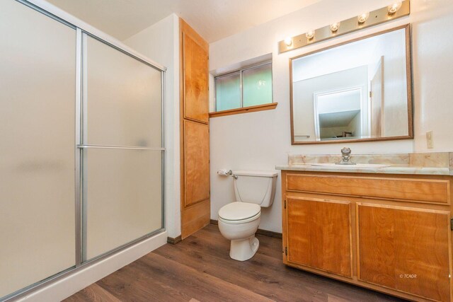 131 Northwoods Ests, Trinity Center, CA 96091 - full bathroom featuring a stall shower, vanity, and wood finished floors