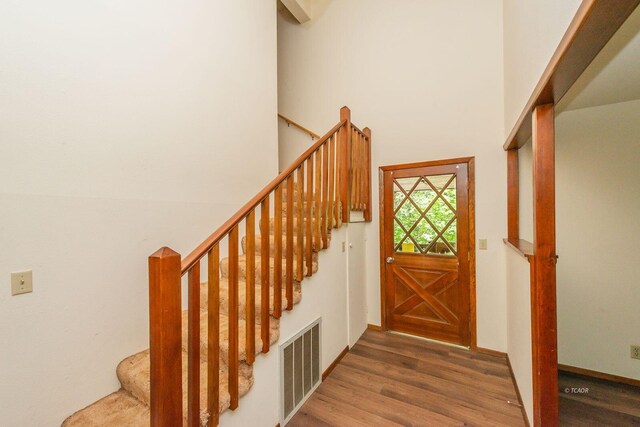 131 Northwoods Ests, Trinity Center, CA 96091 - foyer with wood finished floors, a high ceiling, and stairs