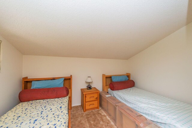131 Northwoods Ests, Trinity Center, CA 96091 - bedroom featuring light colored carpet and a textured ceiling