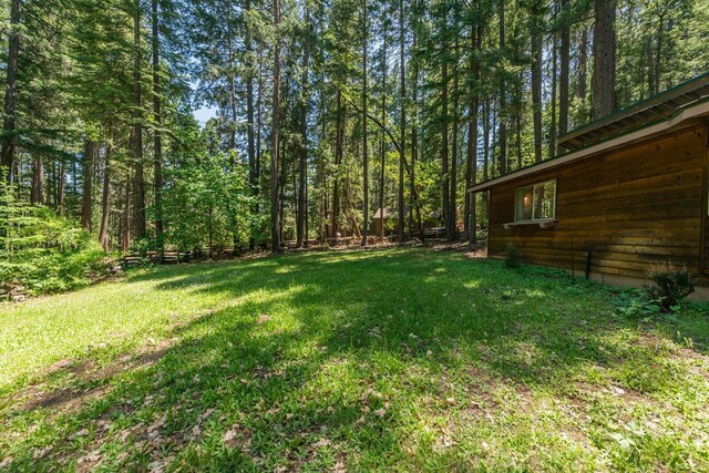 131 Northwoods Ests, Trinity Center, CA 96091 - view of grassy yard with a view of trees