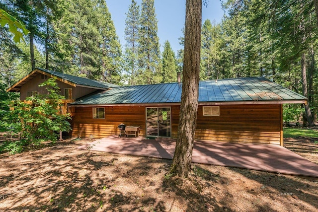 131 Northwoods Ests, Trinity Center, CA 96091 - exterior space with a standing seam roof, a metal roof, and a patio area