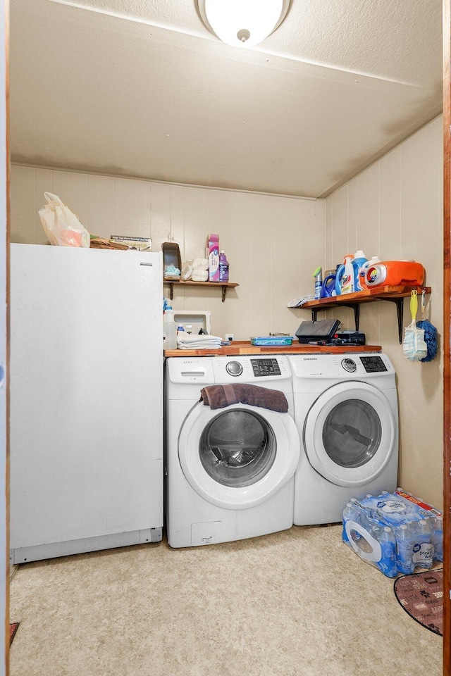 12051 Norma Ln, Redding, CA 96003 - laundry area featuring independent washer and dryer and carpet