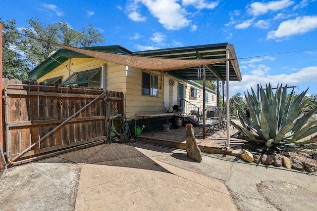12051 Norma Ln, Redding, CA 96003 - view of patio with a deck