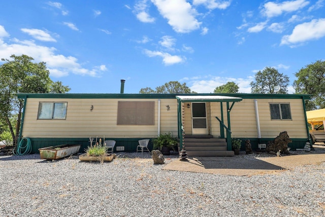 12051 Norma Ln, Redding, CA 96003 - manufactured / mobile home featuring entry steps