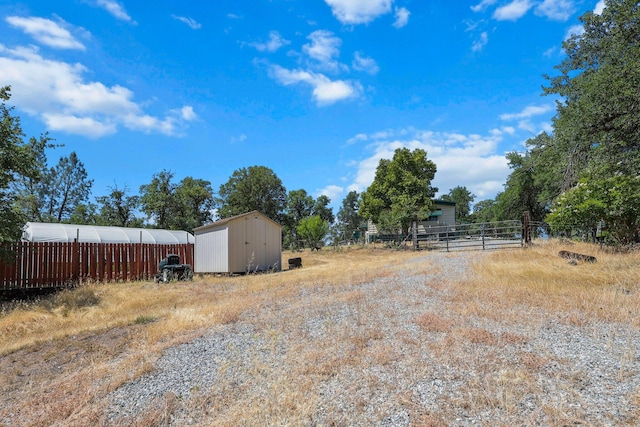 12051 Norma Ln, Redding, CA 96003 - view of yard featuring a storage shed