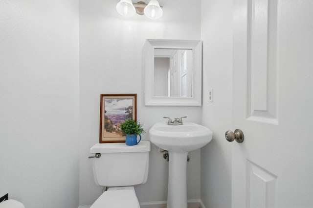 4050 Oro Ct, Redding, CA 96001 - bathroom featuring toilet and baseboards
