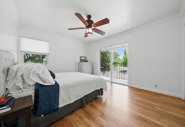 4050 Oro Ct, Redding, CA 96001 - bedroom featuring access to outside, ornamental molding, wood finished floors, and a ceiling fan