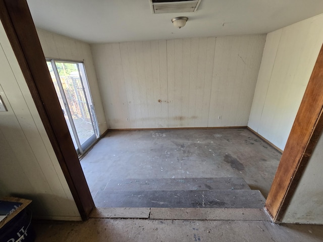 1927 Lindeena Ln, Redding, CA 96002 - unfurnished room featuring unfinished concrete flooring and wood walls