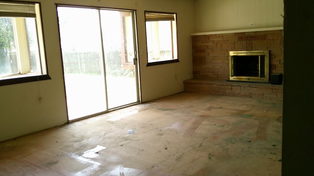 1927 Lindeena Ln, Redding, CA 96002 - unfurnished living room featuring a fireplace with raised hearth