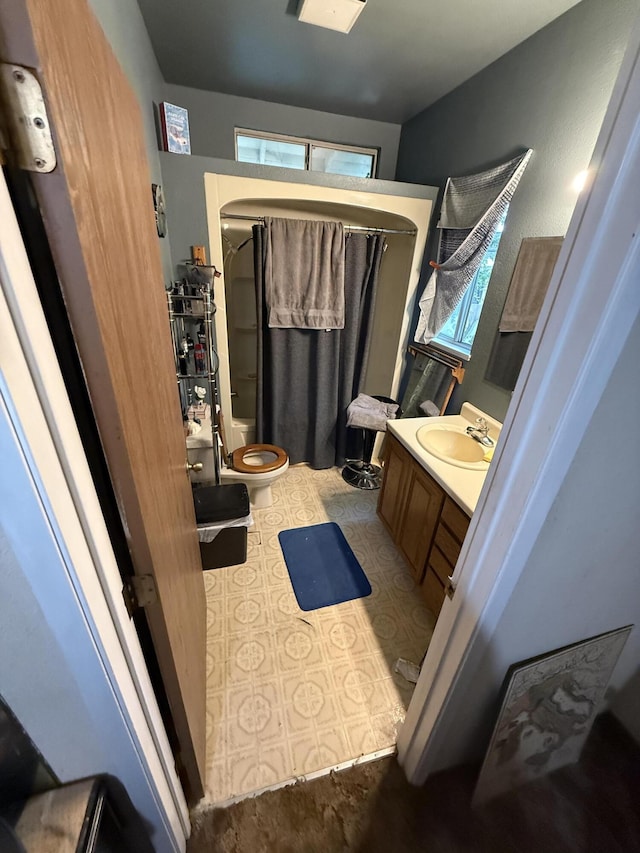 728 Lincoln St, Red Bluff, CA 96080 - full bath with vanity, a shower with shower curtain, and tile patterned floors