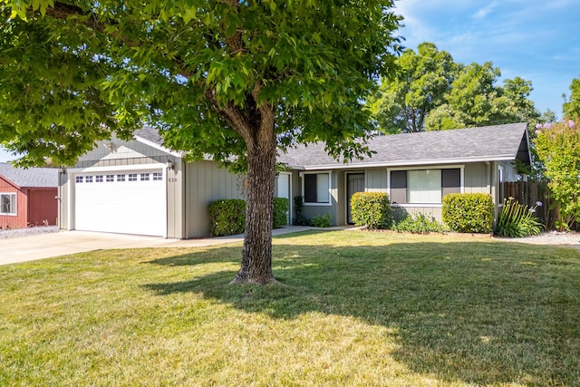 830 Redwood Blvd, Redding, CA 96003 - single story home featuring an attached garage, driveway, and a shingled roof