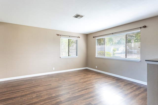 830 Redwood Blvd, Redding, CA 96003 - spare room with dark wood-style floors and baseboards