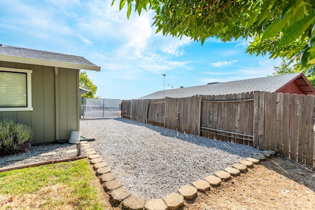 830 Redwood Blvd, Redding, CA 96003 - view of yard featuring a gate