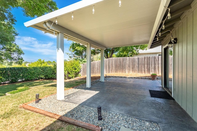 830 Redwood Blvd, Redding, CA 96003 - fenced backyard with a patio