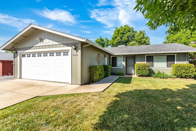 830 Redwood Blvd, Redding, CA 96003 - single story home with a garage, a front yard, driveway, and a shingled roof