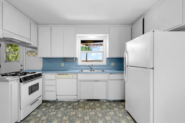 2040 Sonoma St, Redding, CA 96001 - kitchen featuring white appliances, white cabinetry, and light countertops