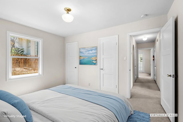 2040 Sonoma St, Redding, CA 96001 - bedroom with light colored carpet and multiple windows