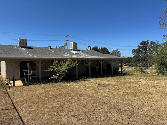 2580 Old Alturas Rd, Redding, CA 96003 - rear view of property featuring a lawn