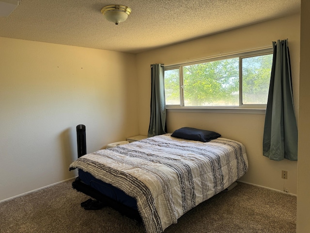 2580 Old Alturas Rd, Redding, CA 96003 - bedroom with carpet floors and a textured ceiling