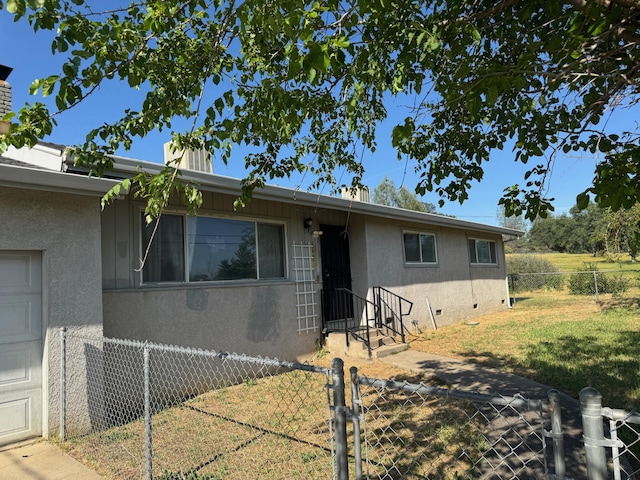 2580 Old Alturas Rd, Redding, CA 96003 - ranch-style home with stucco siding, a gate, and a chimney