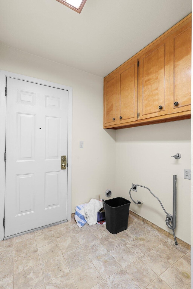 910 Hallmark Dr, Redding, CA 96001 - laundry room featuring cabinet space