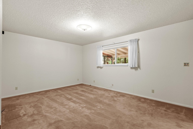 910 Hallmark Dr, Redding, CA 96001 - spare room featuring light carpet and a textured ceiling