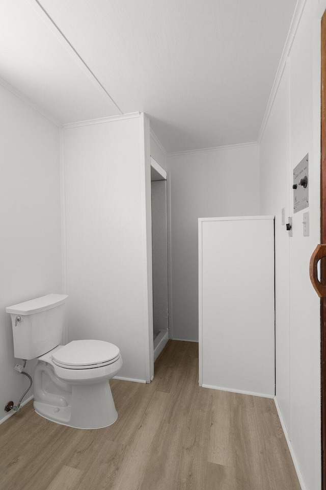 910 Hallmark Dr, Redding, CA 96001 - bathroom featuring wood finished floors and ornamental molding