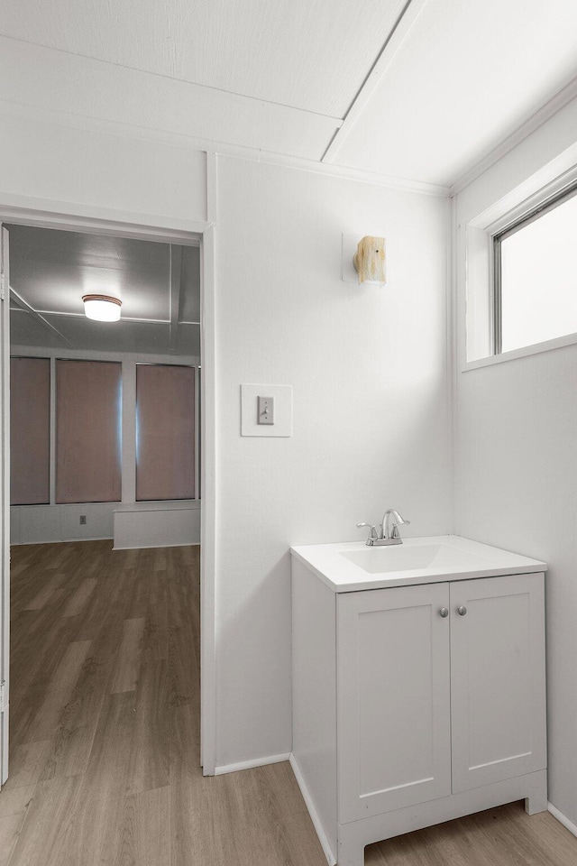 910 Hallmark Dr, Redding, CA 96001 - bathroom with wood finished floors and vanity