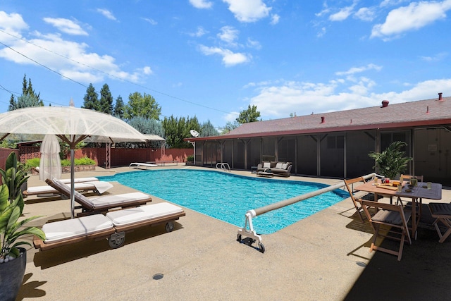 910 Hallmark Dr, Redding, CA 96001 - view of pool with a patio area, a sunroom, and a fenced backyard