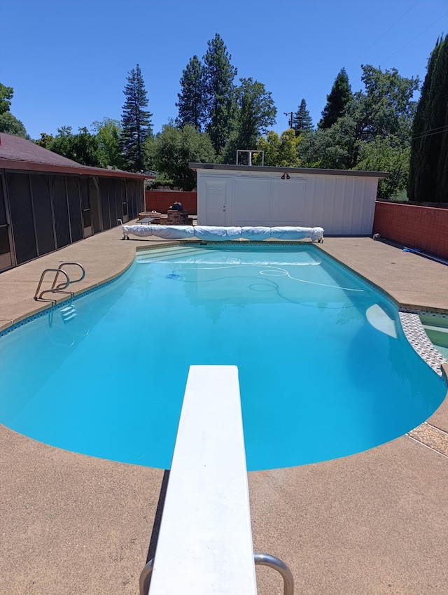 910 Hallmark Dr, Redding, CA 96001 - view of swimming pool with a diving board