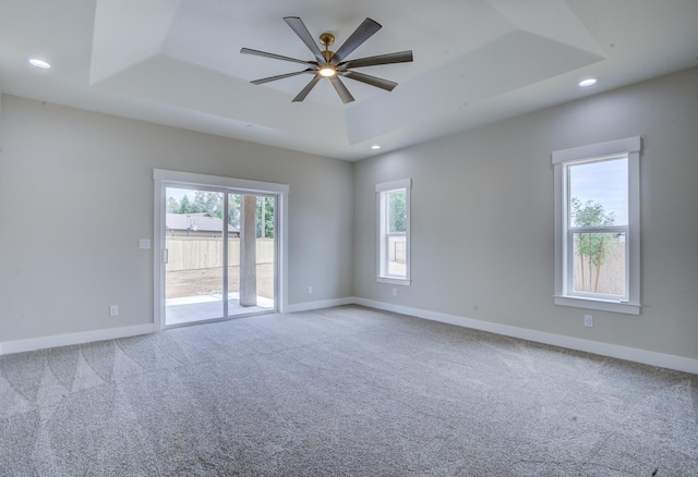 19450 Vista Del Monte Ct, Redding, CA 96003 - carpeted spare room with a tray ceiling, recessed lighting, and a ceiling fan